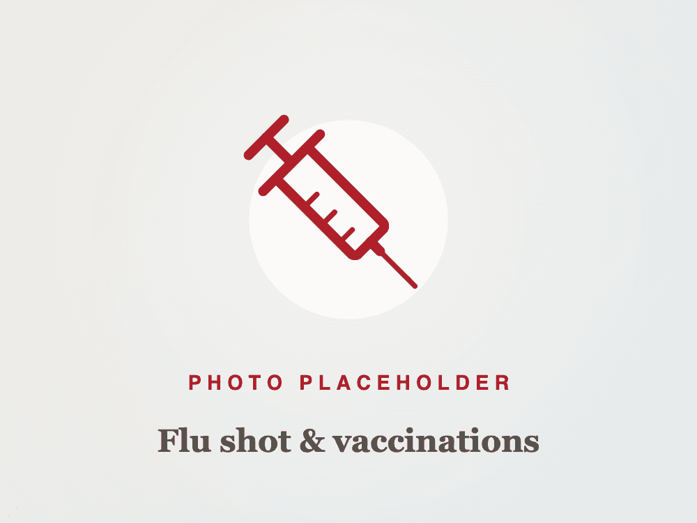 Pharmacist giving a flu shot